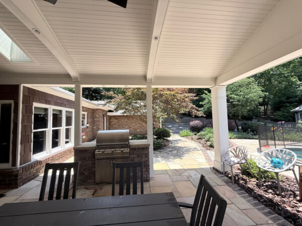 This project involved a comprehensive exterior refresh of a Chattanooga home using soft washing and surface cleaning to safely remove dirt, mold, and residue from the siding, gutters, porches, concrete walkways, brick retaining walls, entryway columns, wooden swing, and stone pool deck.