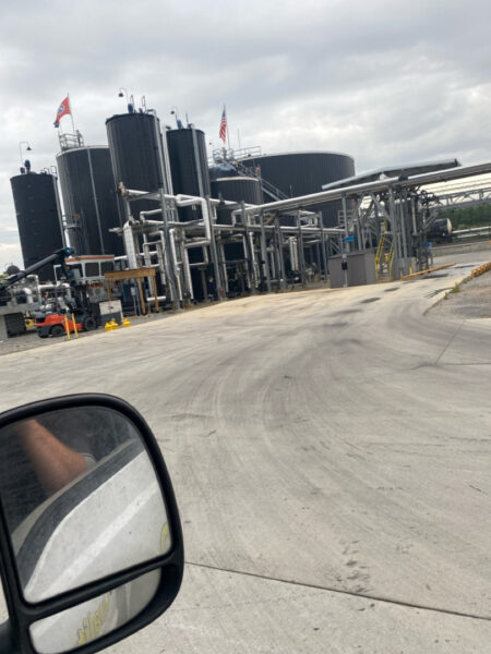 Professional surface washing and detergent treatment were performed on the concrete entrance and exit pads of a commercial scale in Chattanooga to remove organic buildup while strictly adhering to site-specific exclusion zones.