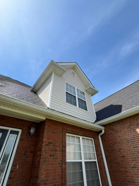 This project involved a comprehensive soft-wash cleaning of a two-story residence in Ringgold, using a low-pressure detergent blend and gentle hand agitation to safely remove organic growth and debris from all exterior siding, trim, gutters, and downspouts.