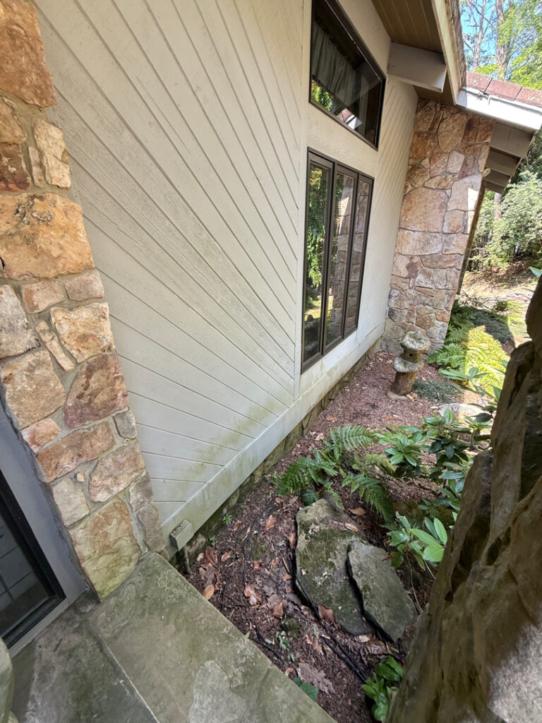 This project involved a comprehensive exterior refresh of a one-story Signal Mountain home, including soft washing the front facade, porch, and hardscape surfaces alongside interior and exterior window glass cleaning.