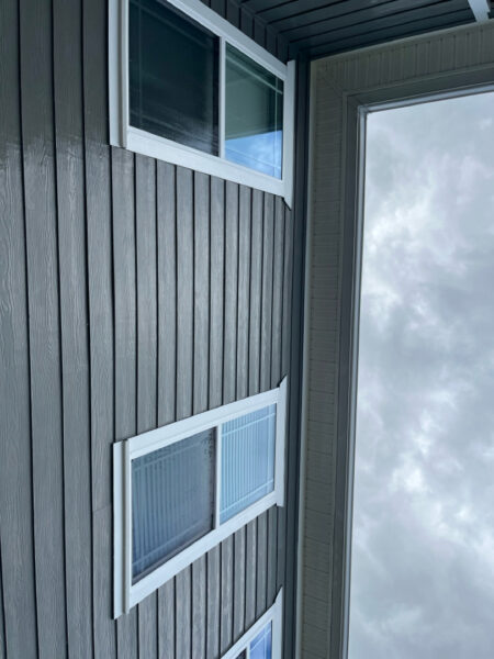 This project utilized a professional soft wash process to comprehensively clean the exterior surfaces of a one-story residence, pool house, deck, and screened-in porch in Soddy-Daisy, effectively removing organic growth and contaminants to restore the property's appearance.