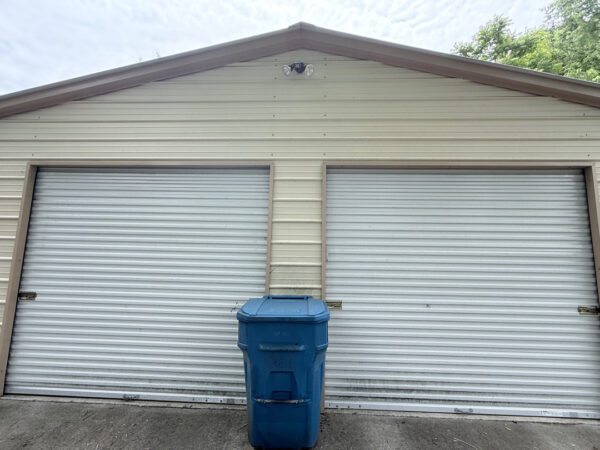This project involved a comprehensive soft wash cleaning of a one-story residence, metal garage, and wood deck in Chattanooga to remove organic growth and dirt while preserving the integrity of all exterior surfaces.
