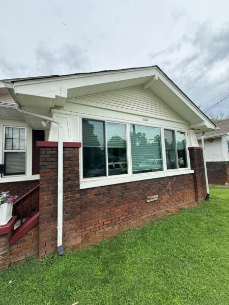 This project involved a comprehensive soft wash of a two-story Chattanooga residence and its wood deck, utilizing low-pressure detergent applications to safely and effectively remove organic growth, dirt, and stains from all exterior surfaces.