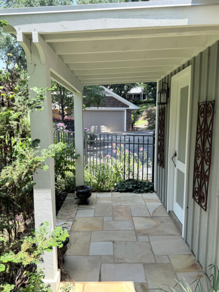 This project involved a comprehensive exterior refresh of a Chattanooga home using soft washing and surface cleaning to safely remove dirt, mold, and residue from the siding, gutters, porches, concrete walkways, brick retaining walls, entryway columns, wooden swing, and stone pool deck.