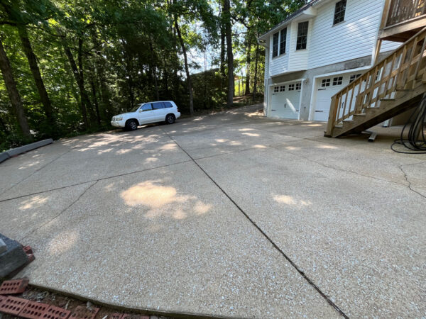 This project in Hixson restored the home's exterior, concrete walkway, driveway, and wood deck through specialized low-pressure soft washing and thorough rinsing to remove mold, mildew, dirt, and other surface contaminants.