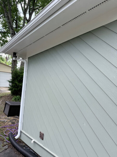 This project involved a comprehensive soft wash cleaning of a one-story residence, metal garage, and wood deck in Chattanooga to remove organic growth and dirt while preserving the integrity of all exterior surfaces.
