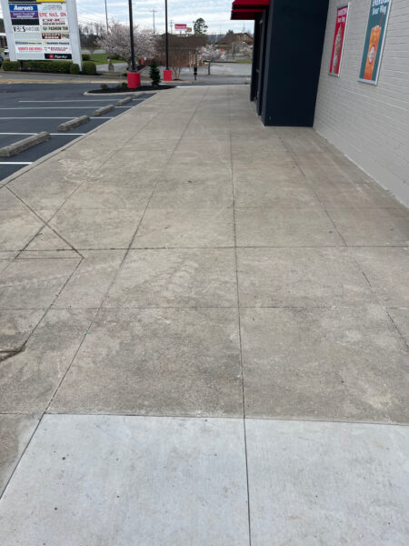 This commercial cleaning project in Fort Oglethorpe restored the property's exterior appeal by thoroughly washing the building, delicate awnings, concrete drive-thru lanes, dumpster area, and parking pads.