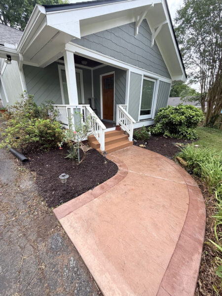 This project involved a comprehensive soft wash cleaning of a one-story residence, metal garage, and wood deck in Chattanooga to remove organic growth and dirt while preserving the integrity of all exterior surfaces.