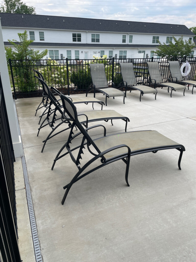 The project involved a comprehensive cleaning of a shared patio and pavilion in Chattanooga through debris removal, pressure washing of surfaces, and detailed treatment of structural elements to restore the area for public use.