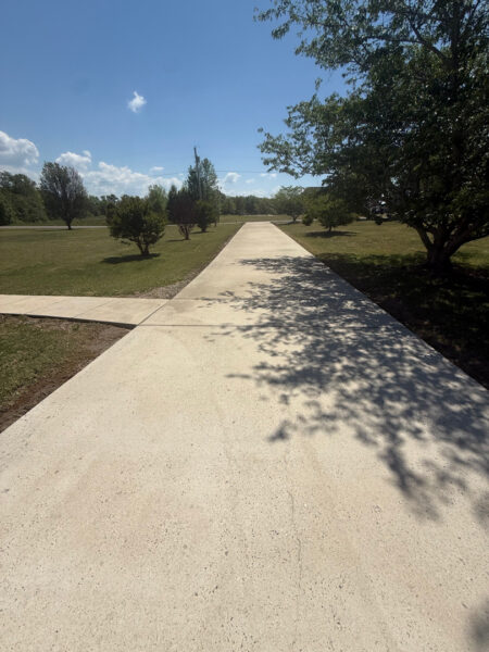 This project in Ider featured a comprehensive soft wash of the residence and garage along with a restorative surface treatment of the driveway and walkways to remove organic growth and prepare exterior wood surfaces for painting.
