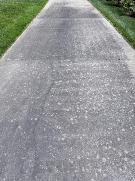 The team performed a targeted soft-wash of the front porches, vertical surfaces, and brick steps of a one-story residence in Chattanooga, complemented by a professional surface cleaning of the driveway, sidewalk, and walkways to enhance curb appeal.