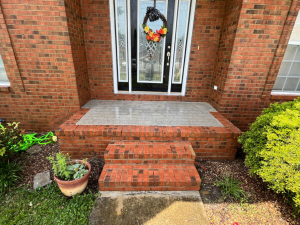 This project involved a comprehensive soft-wash cleaning of a two-story residence in Ringgold, using a low-pressure detergent blend and gentle hand agitation to safely remove organic growth and debris from all exterior siding, trim, gutters, and downspouts.