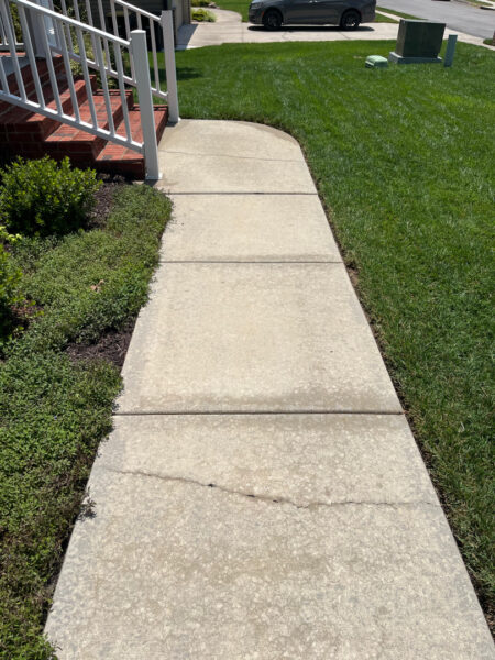 This project involved a comprehensive exterior concrete cleaning of a driveway, front walkway, and sidewalk in Apison using specialized detergents, surface washing equipment, and a thorough rinse to remove mold, mildew, and grime.