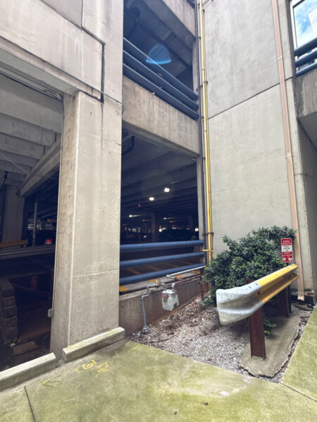 This project encompassed an exterior refresh of a Chattanooga commercial property through power washing structural surfaces, repainting pedestrian bridge handrails, pressure washing concrete areas, and hand-cleaning second-story windows.