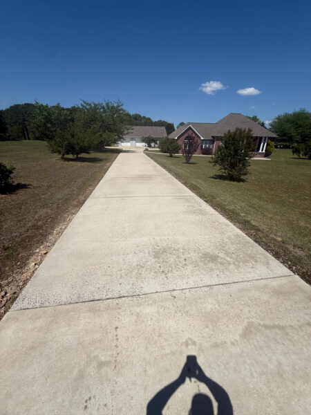 This project in Ider featured a comprehensive soft wash of the residence and garage along with a restorative surface treatment of the driveway and walkways to remove organic growth and prepare exterior wood surfaces for painting.