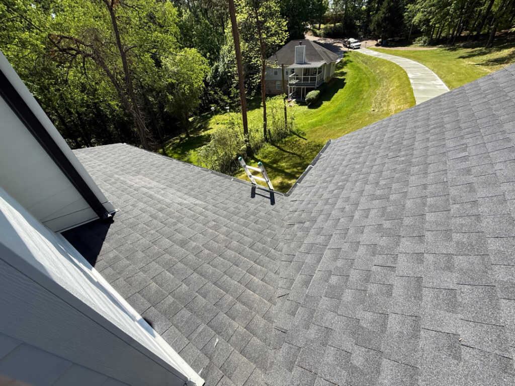 This project involved a comprehensive exterior rinse of a newly constructed Chattanooga home, including the house, garage, gutters, driveway, walkway, and patio, to remove construction dust, debris, and stains for a polished, move-in-ready appearance.
