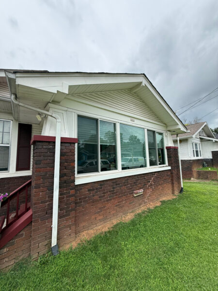 This project involved a comprehensive soft wash of a two-story Chattanooga residence and its wood deck, utilizing low-pressure detergent applications to safely and effectively remove organic growth, dirt, and stains from all exterior surfaces.