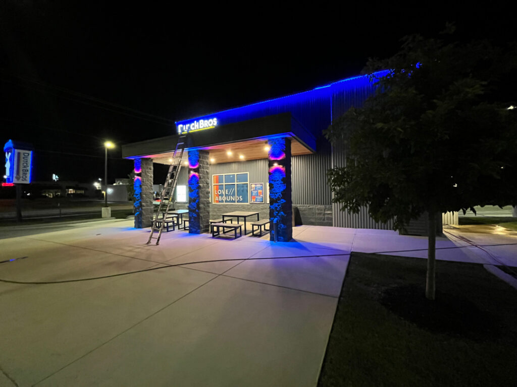 This commercial building in Chattanooga receives a biannual, low-pressure soft wash treatment to remove organic growth and debris from its masonry facade while preserving the integrity of the structure.