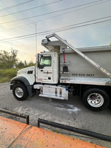 This project involved an on-site exterior fleet wash and targeted tar removal for a mixed fleet of cars and trucks in Chattanooga, successfully restoring the vehicles' appearance by safely removing road contaminants, tar, and grime without damaging the paint.