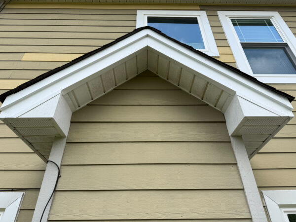 This project involved a comprehensive soft wash of a two-story residence in Ringgold to remove organic buildup from all exterior surfaces and prepare the screened porch for painting.