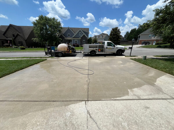 This project involved a comprehensive exterior concrete cleaning of a driveway, front walkway, and sidewalk in Apison using specialized detergents, surface washing equipment, and a thorough rinse to remove mold, mildew, and grime.