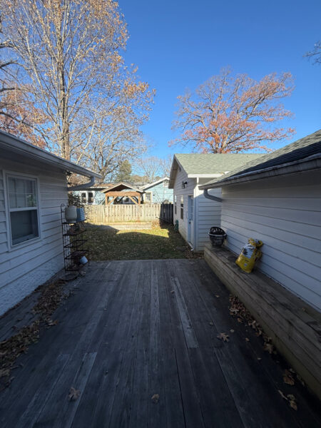 This project involved a comprehensive soft wash of the home's various siding materials and a wood deck to remove organic growth and surface contaminants while preserving the integrity of all finishes.