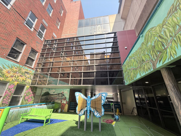 This project encompassed an exterior refresh of a Chattanooga commercial property through power washing structural surfaces, repainting pedestrian bridge handrails, pressure washing concrete areas, and hand-cleaning second-story windows.
