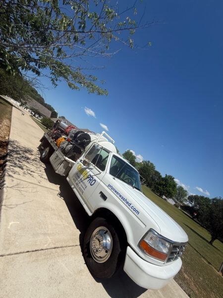 This project in Ider featured a comprehensive soft wash of the residence and garage along with a restorative surface treatment of the driveway and walkways to remove organic growth and prepare exterior wood surfaces for painting.