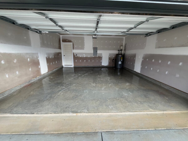 The project involved a comprehensive exterior rinse of a newly constructed home in Chattanooga, including the siding, garage, driveway, and walkways, to remove construction dust and debris for a move-in-ready finish.