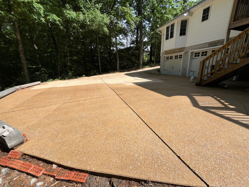 This project in Hixson restored the home's exterior, concrete walkway, driveway, and wood deck through specialized low-pressure soft washing and thorough rinsing to remove mold, mildew, dirt, and other surface contaminants.