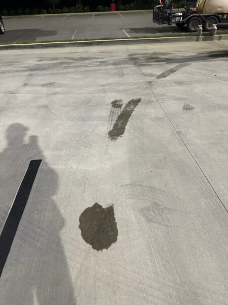 This commercial exterior restoration project in Ooltewah revitalized the property's curb appeal by thoroughly cleaning the building's facade, awnings, drive-thru lane, dumpster pad, and parking areas to remove heavy grime, stains, and organic buildup.