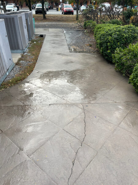 The project at Urban Stack in Chattanooga involved inspecting and thoroughly pressure washing the restaurant's exterior sidewalks, dining patios, and side entrance to remove dirt, stains, and grease, thereby restoring a clean appearance and improving pedestrian safety.
