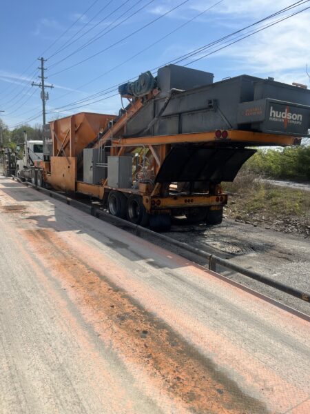 The project involved bi-weekly deluxe exterior cleaning and aluminum brightening of multiple tanker trailers in Chattanooga using a methodical process of pressure washing, specialized chemical application, and manual scrubbing to maintain fleet appearance and protection.
