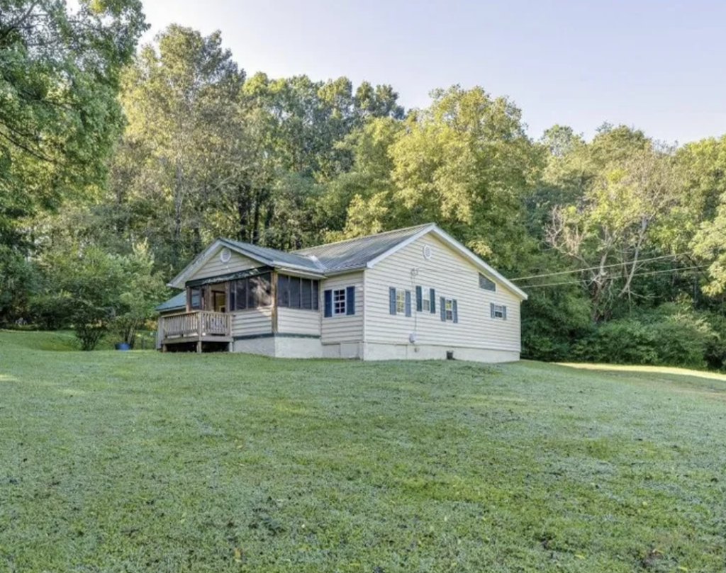 This project involved a comprehensive low-pressure soft wash of a single-story home's exterior surfaces, including siding, trim, and gutters, to remove organic growth and restore a uniform appearance.