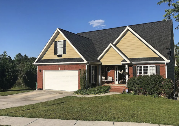 This concrete cleaning project in Ooltewah involved a specialized oil stain treatment and a comprehensive surface detergent wash to remove organic buildup and restore the driveway's appearance.