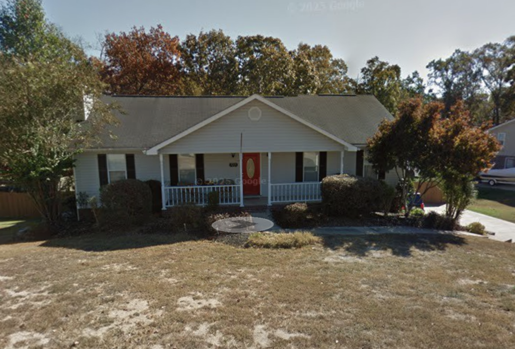 A one-story home in Harrison featuring vinyl, brick, and stucco siding received a tailored, low-pressure exterior soft wash that successfully removed dirt, mold, and mildew while leaving the deck and screen porch untouched per the homeowner's request.