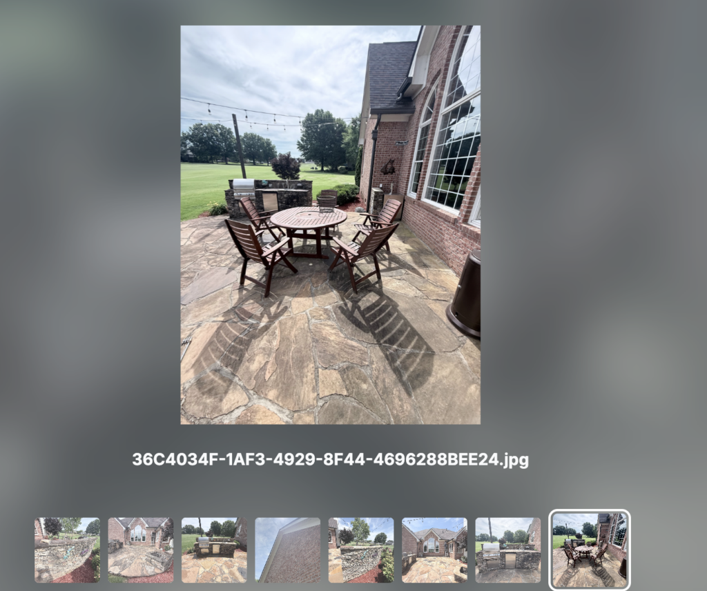 Professional-grade pressure washing and soft washing techniques were used to thoroughly clean the Chattanooga property's concrete driveway, walkways, siding, and patio, successfully removing dirt, algae, and grime to restore its curb appeal.