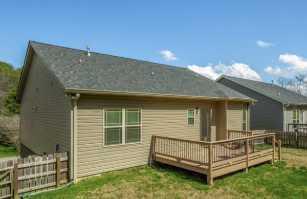 This project involved a comprehensive exterior refresh of a two-story Chattanooga home, including a soft-wash house cleaning with a mold warranty, a driveway concrete wash, gutter debris removal, and exterior window cleaning to restore both curb appeal and functionality.