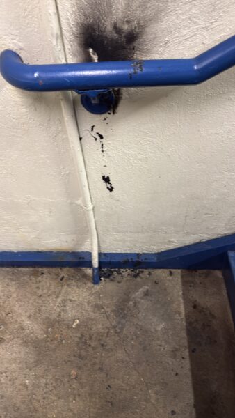 The back and interior deck stairwells of the CARTA North Garage were thoroughly cleaned and restored through pressure washing, floor scrubbing, handrail sanitization, and detailed dusting of walls, baseboards, and overhead surfaces.
