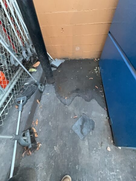 Professional power washing and detergent cleaning were performed on the front stained sidewalk, additional sidewalk sections, the back dock, and the dumpster enclosure to remove all surface debris and buildup.