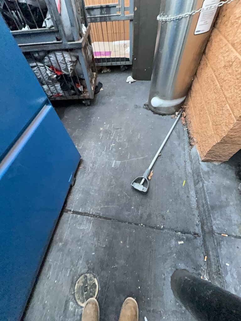 Professional power washing and detergent cleaning were performed on the front stained sidewalk, additional sidewalk sections, the back dock, and the dumpster enclosure to remove all surface debris and buildup.