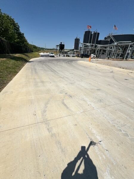 Professional surface washing and detergent treatment were performed on the concrete entrance and exit pads of a commercial scale in Chattanooga to remove organic buildup while strictly adhering to site-specific exclusion zones.