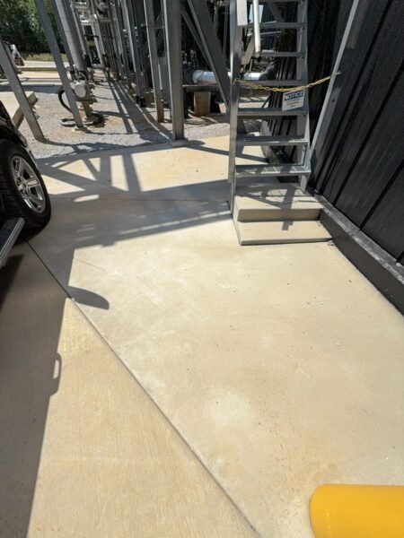 Professional surface washing and detergent treatment were performed on the concrete entrance and exit pads of a commercial scale in Chattanooga to remove organic buildup while strictly adhering to site-specific exclusion zones.