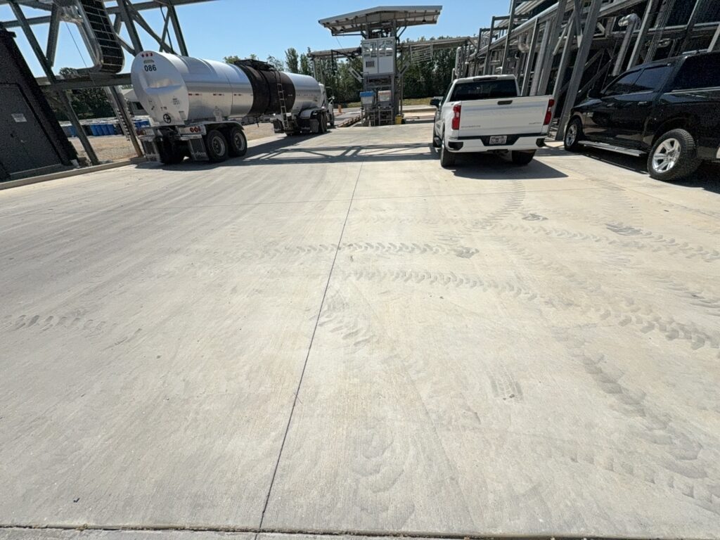 Professional surface washing and detergent treatment were performed on the concrete entrance and exit pads of a commercial scale in Chattanooga to remove organic buildup while strictly adhering to site-specific exclusion zones.