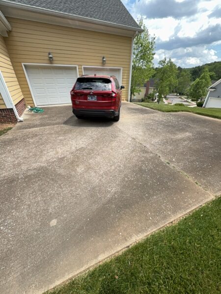 The team performed a targeted soft-wash of the front porches, vertical surfaces, and brick steps of a one-story residence in Chattanooga, complemented by a professional surface cleaning of the driveway, sidewalk, and walkways to enhance curb appeal.