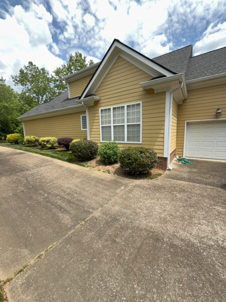 The team performed a targeted soft-wash of the front porches, vertical surfaces, and brick steps of a one-story residence in Chattanooga, complemented by a professional surface cleaning of the driveway, sidewalk, and walkways to enhance curb appeal.
