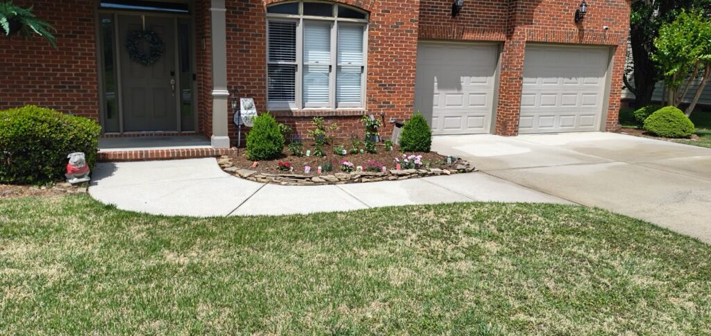 A professional concrete wash project was performed in Apison to restore the driveway, walkways, sidewalks, and curb line by applying specialized detergents and using professional surface washing equipment to safely remove dirt and organic growth before a final, thorough rinse.