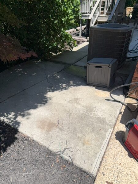 This comprehensive exterior cleaning project involved a full soft wash of the home's surfaces, a dedicated pressure wash of concrete hardscapes and retaining walls, and a gentle cleaning of the wood deck and mailbox to remove organic growth and restore the property's appearance.