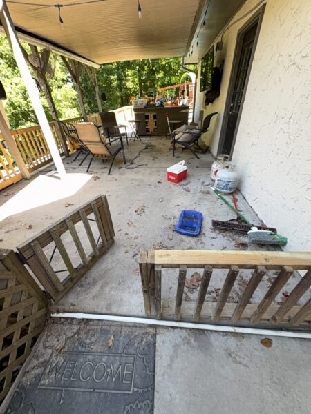 This comprehensive exterior cleaning project involved a full soft wash of the home's surfaces, a dedicated pressure wash of concrete hardscapes and retaining walls, and a gentle cleaning of the wood deck and mailbox to remove organic growth and restore the property's appearance.