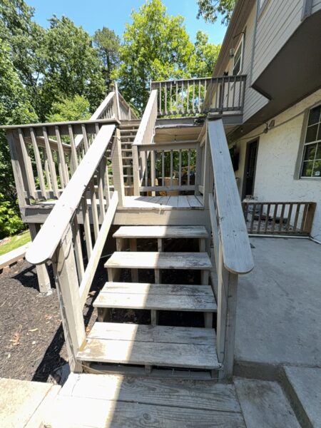 This comprehensive exterior cleaning project involved a full soft wash of the home's surfaces, a dedicated pressure wash of concrete hardscapes and retaining walls, and a gentle cleaning of the wood deck and mailbox to remove organic growth and restore the property's appearance.